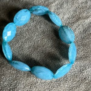 Blue plastic bracelet